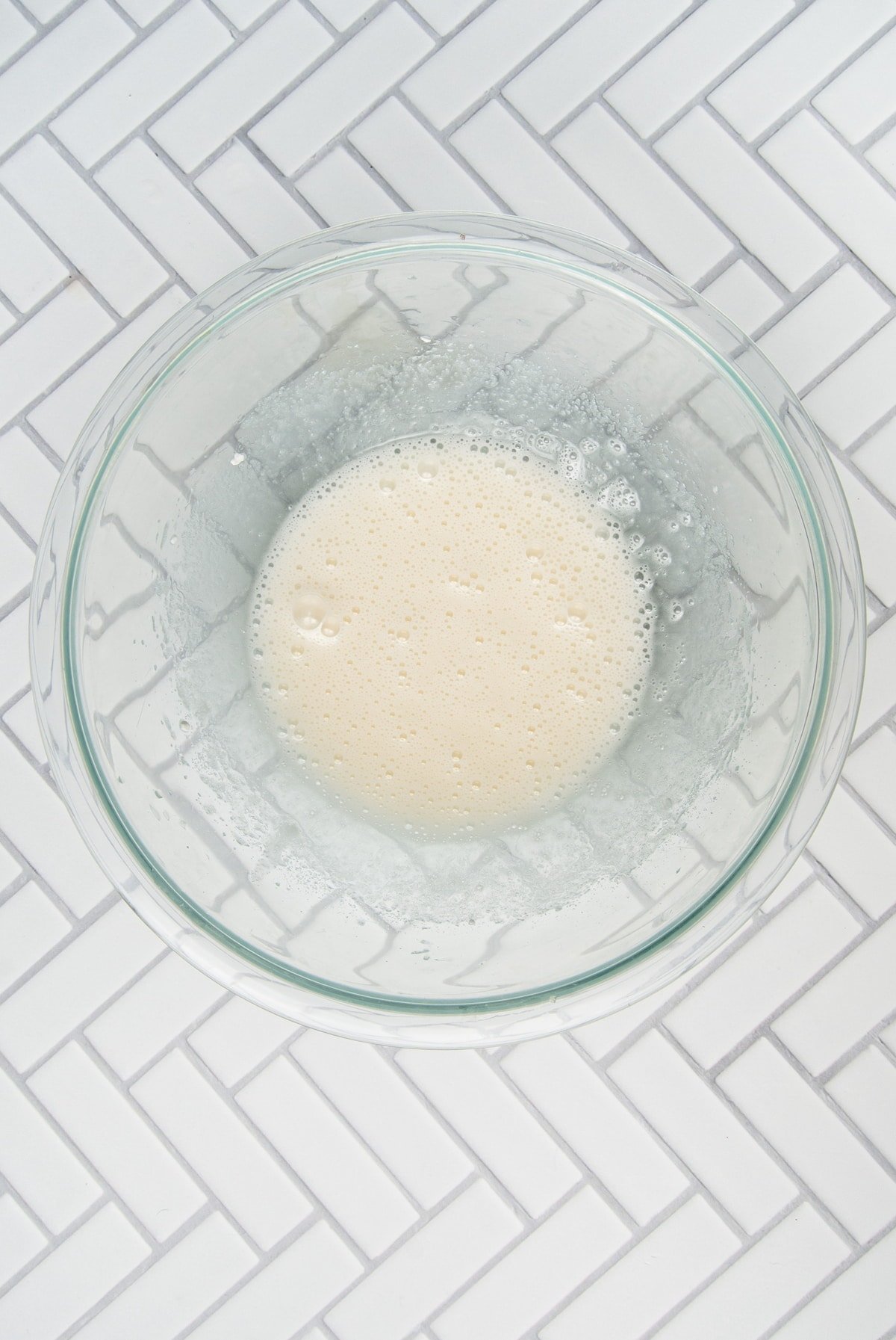 egg whites and sugar combines with hand mixer