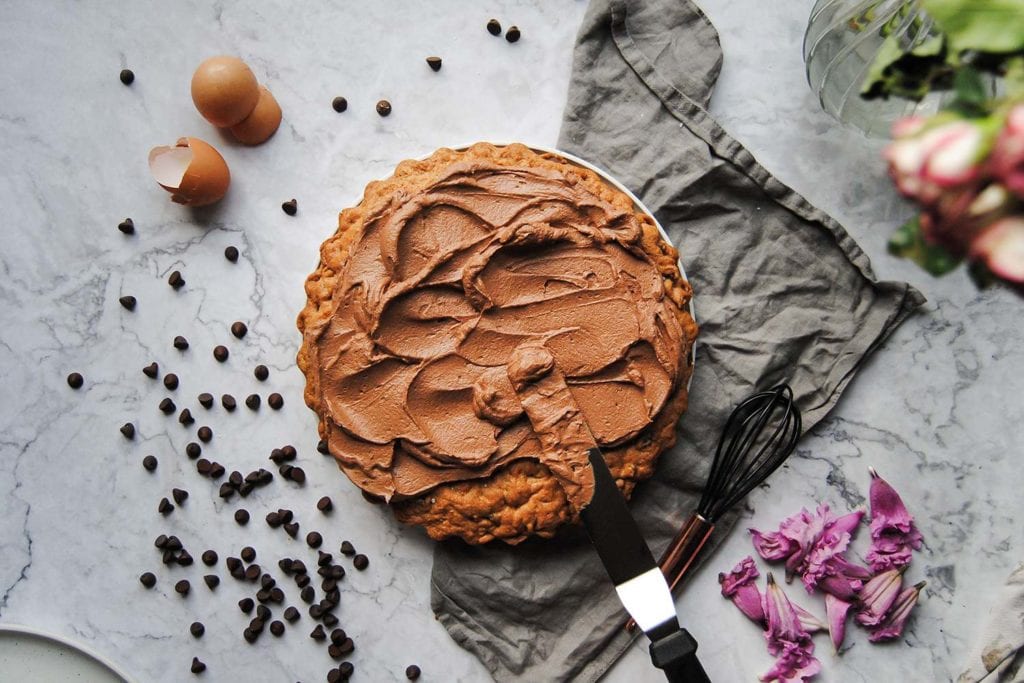 Adding Ganache to Cookie Cake