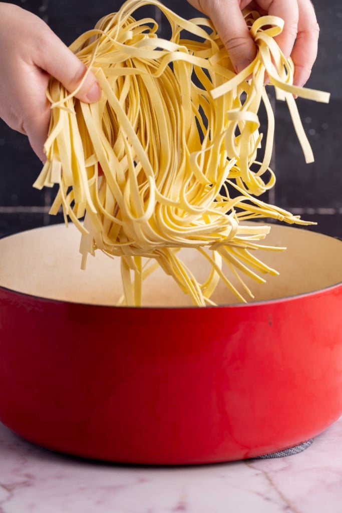 Separating fresh pasta and adding it to a Dutch Oven