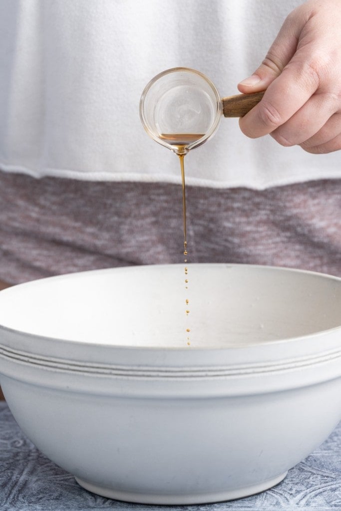 Adding vanilla extract to chocolate chip muffin batter