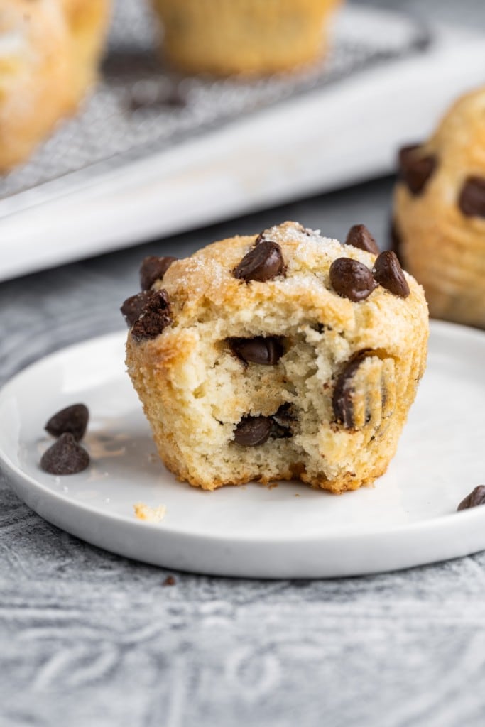 Close up of chocolate chip muffin with bite taken out