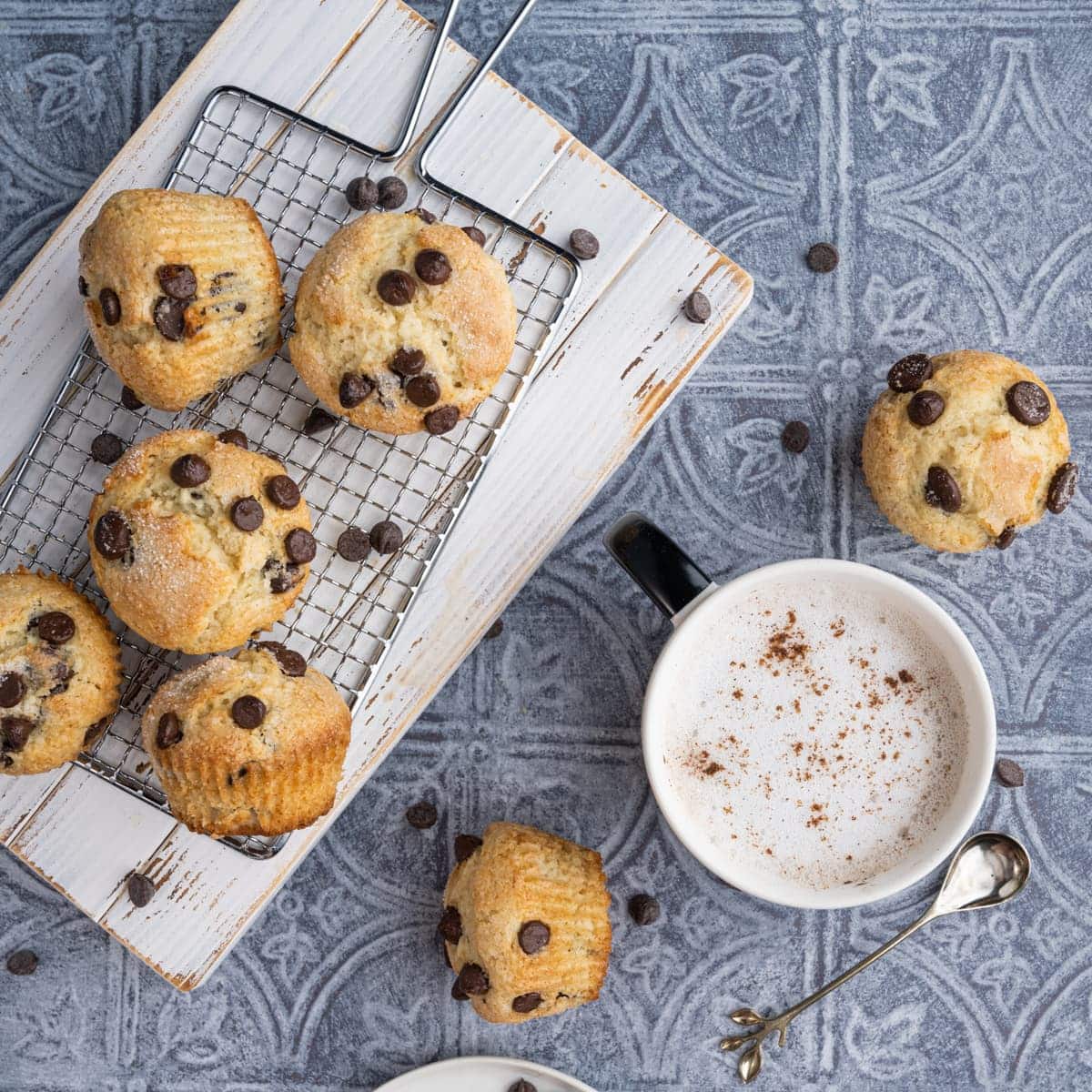 One-Bowl Chocolate Chip Muffins with a mug of coffee