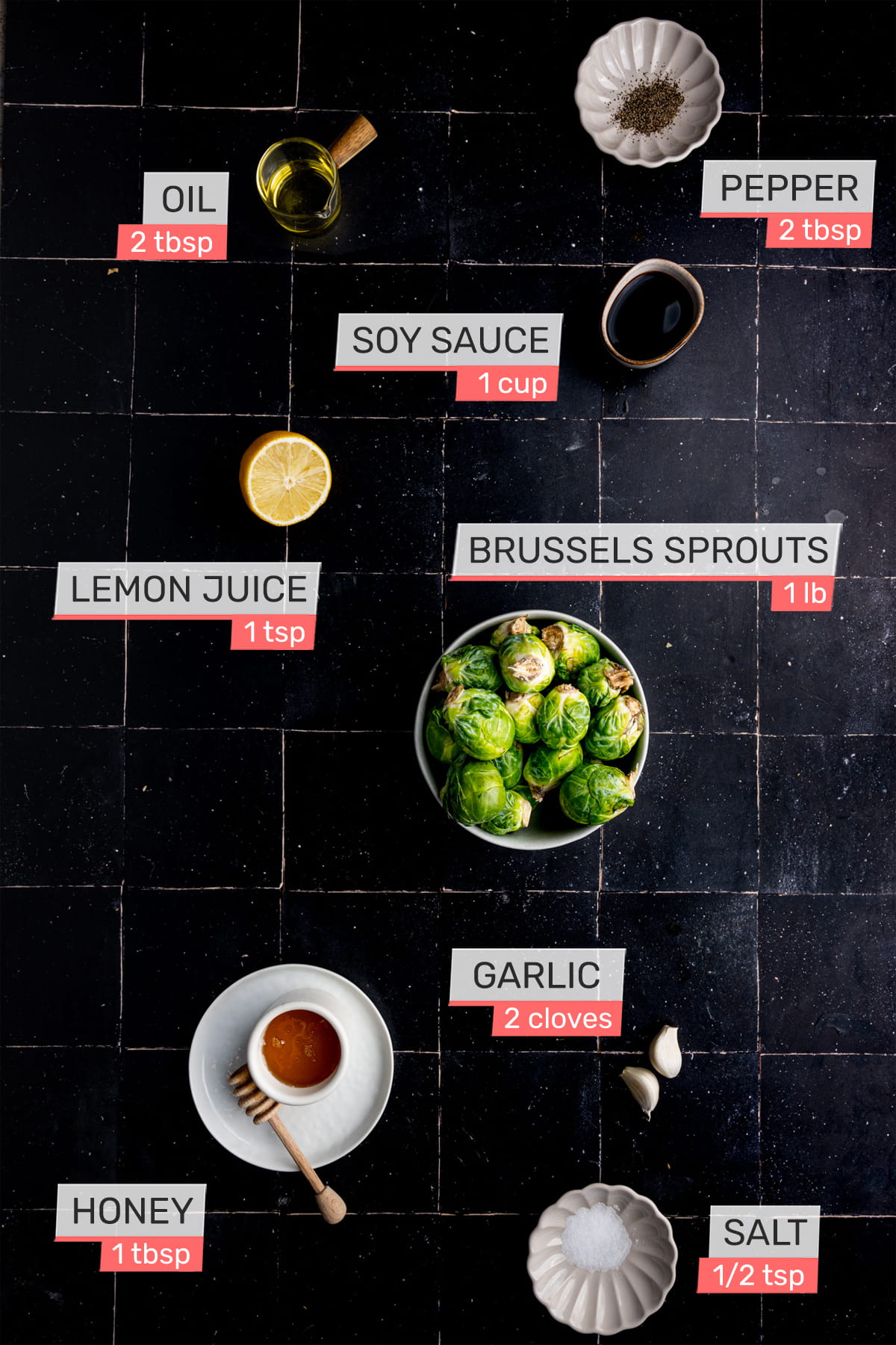 Overhead view of all ingredients sweet and salty brussels sprouts - oil, pepper, soy sauce, lemon juice, brussels sprouts, garlic, honey, salt