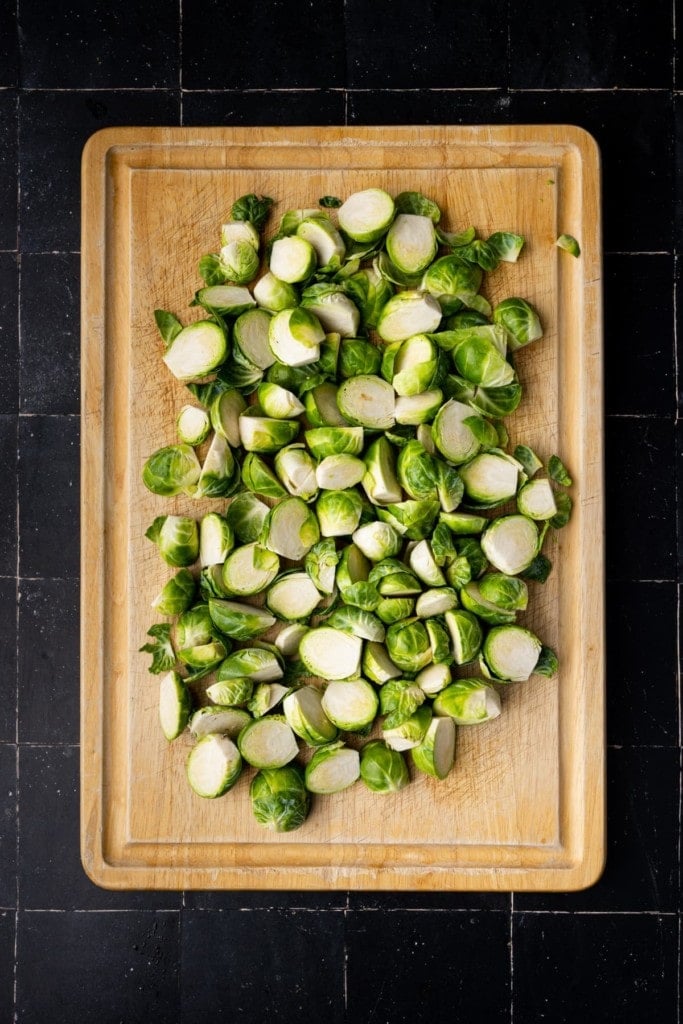 prepped brussels sprouts on a cutting board