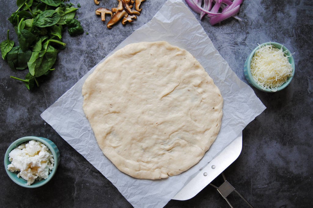 Quick Knead and Rise Pizza Dough - Cooking On Baking Sheet
