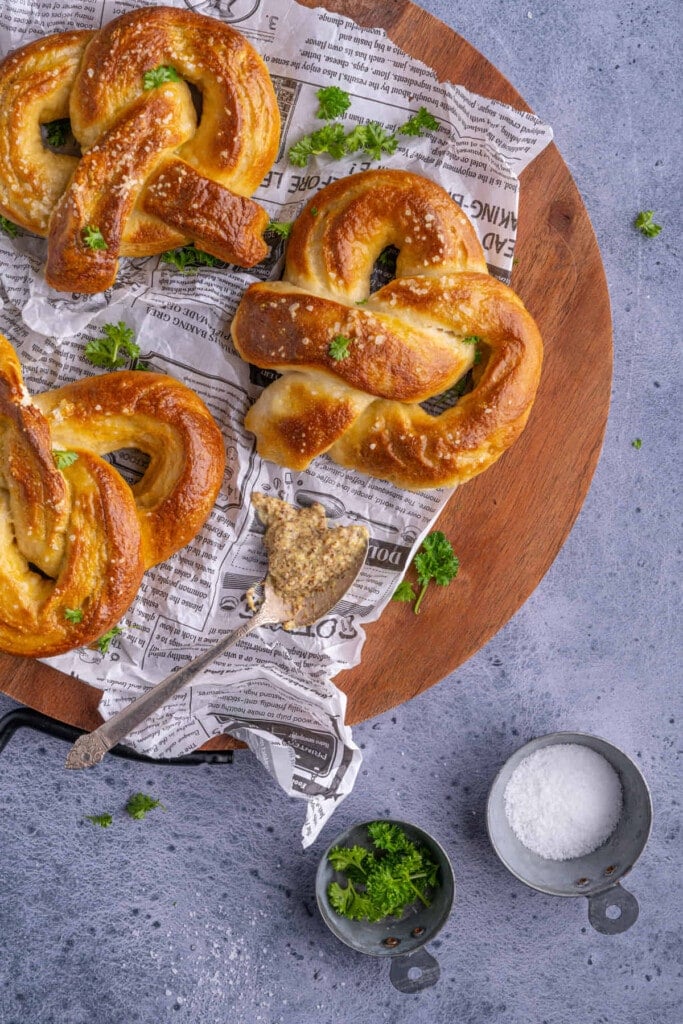 Overhead shot of Homemade German Soft Pretzels with mustard