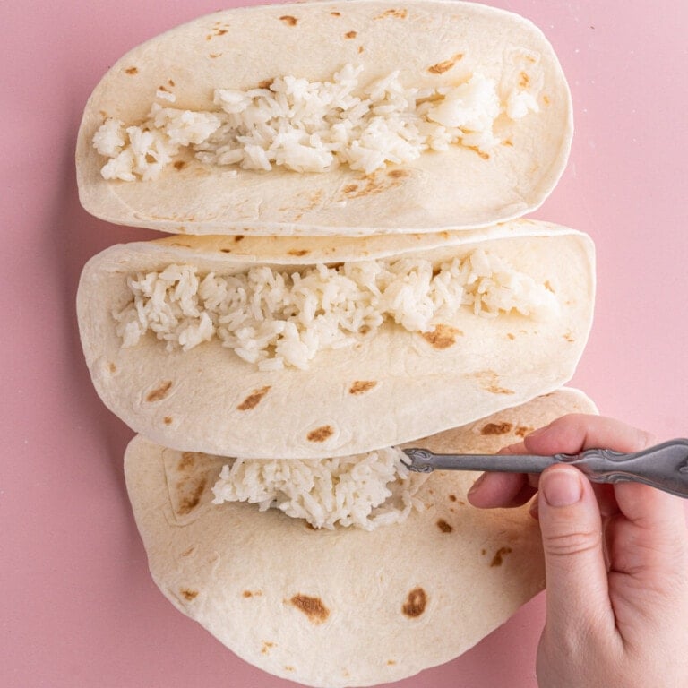 Thin layer of coconut rice in flour tortillas