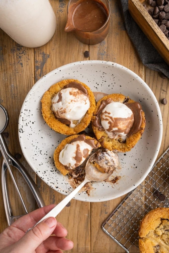 overhead shot of cookie dough cups with vanilla ice cream inside