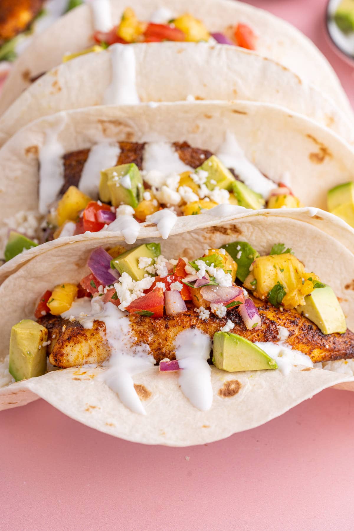 Close up of Blackened Fish Tacos with Pineapple Salsa.