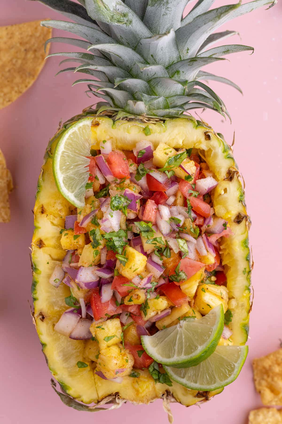 Close up of Pineapple Pico de Gallo served in a cored pineapple