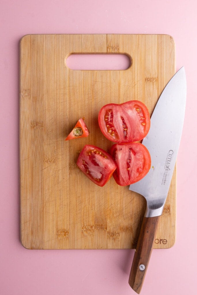 Slicing tomato around the core