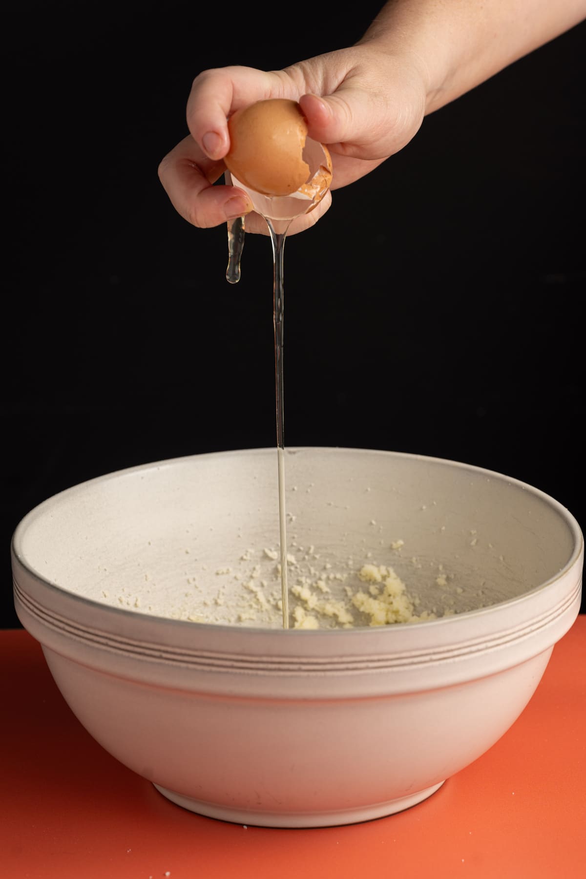 Adding egg to Halloween cookie dough