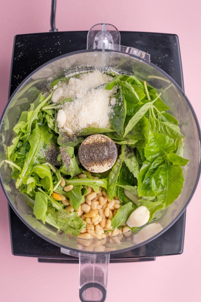 Overhead shot of all ingredients in food processor ready to be blended.