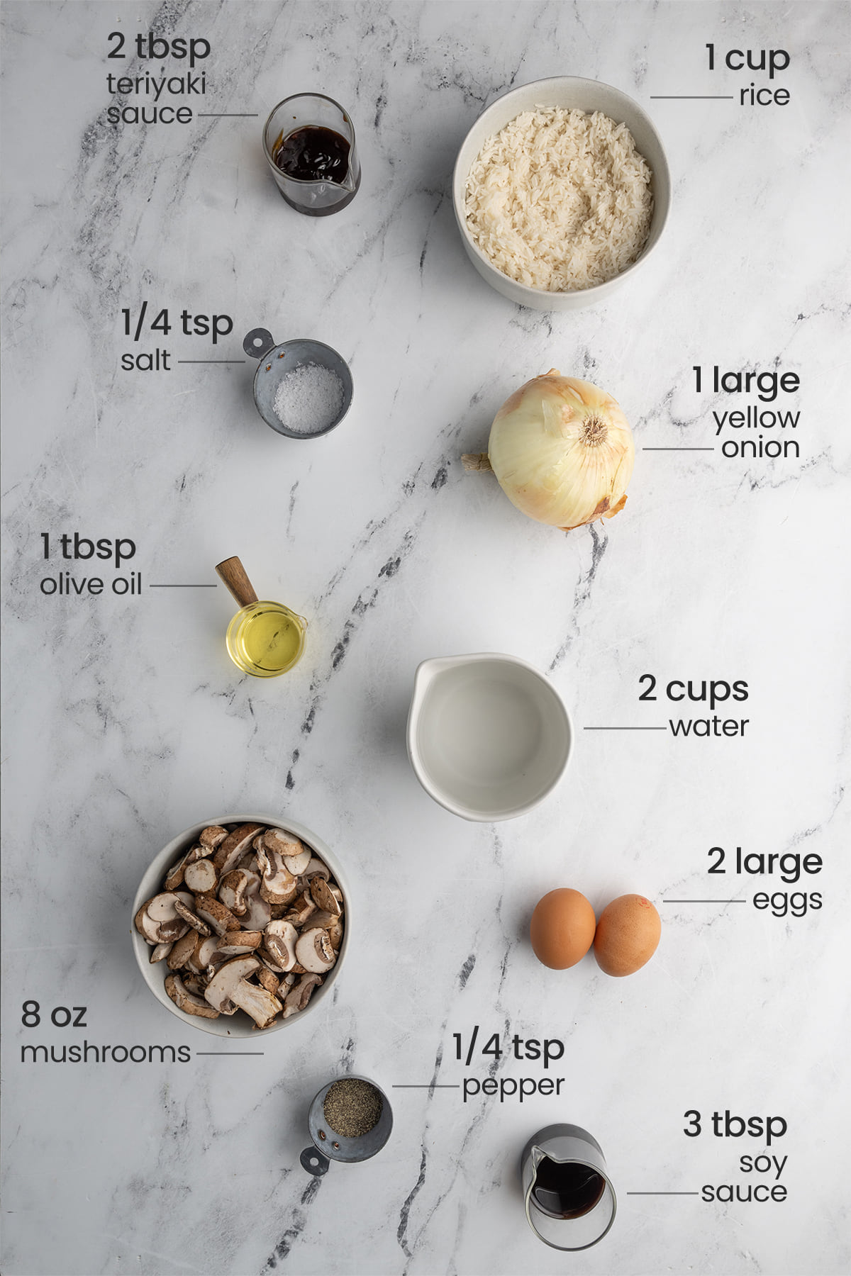 ingredients for mushroom fried rice - teriyaki sauce, rice, salt, yellow onion, olive oil, water, eggs, mushrooms, pepper, soy sauce