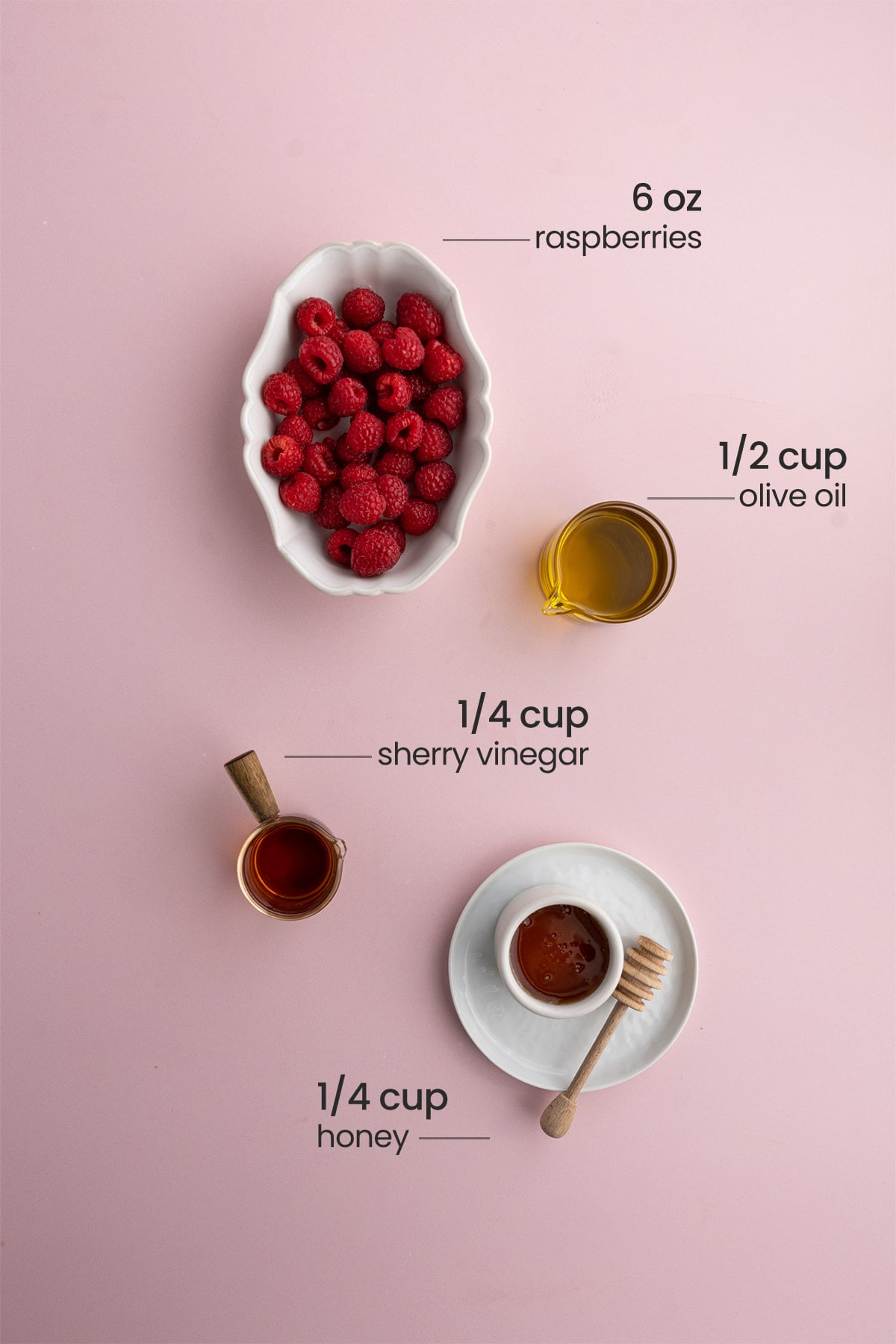 ingredients for raspberry vinaigrette - raspberries, olive oil, sherry vinegar, honey