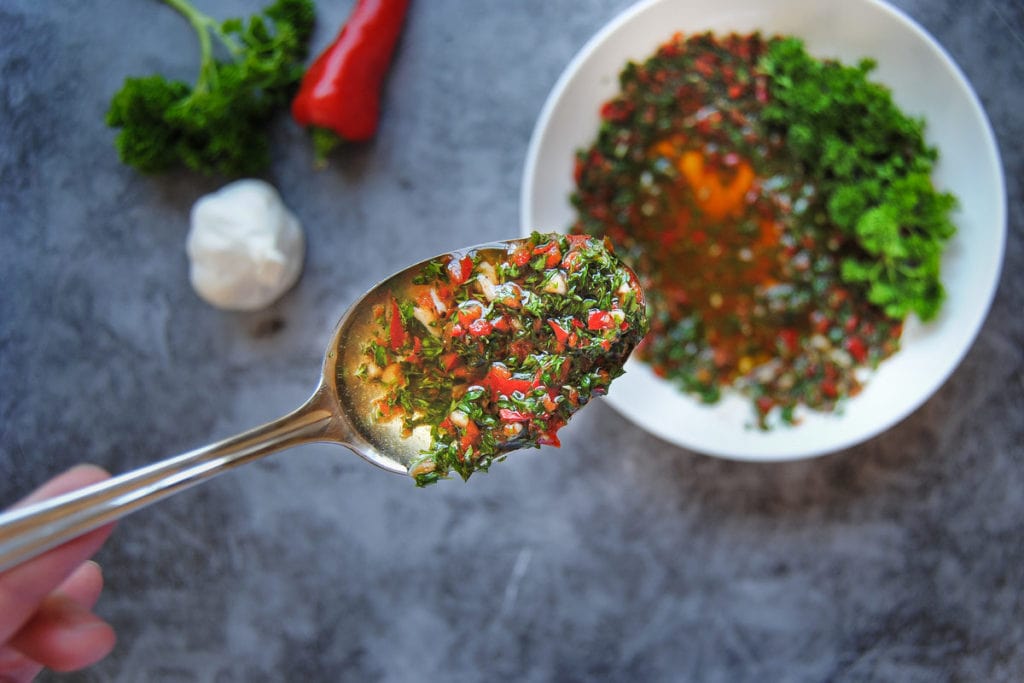 Spicy Serrano Pepper Chimichurri Sauce - Close Up On Spoon