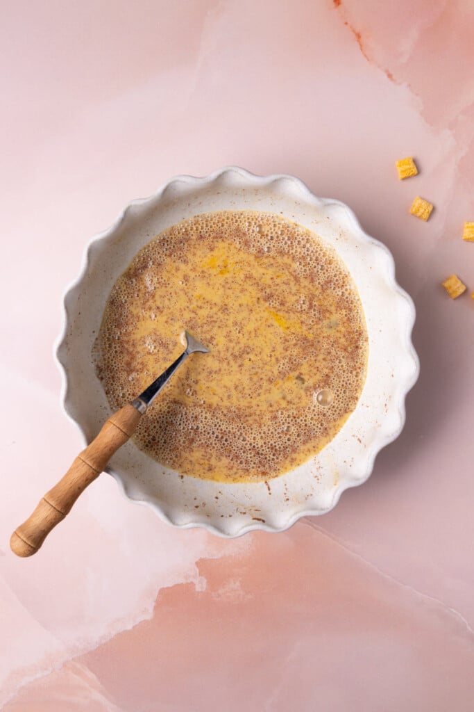 Egg wash with vanilla extract and cinnamon mixed in.