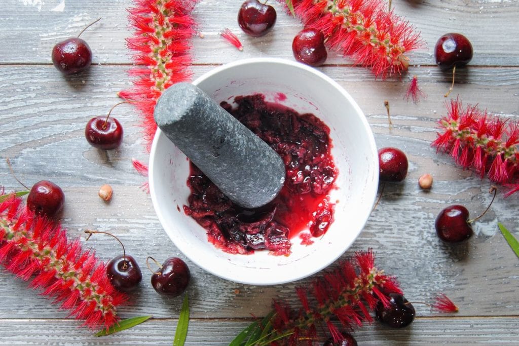 Muddling Cherries with Sugar