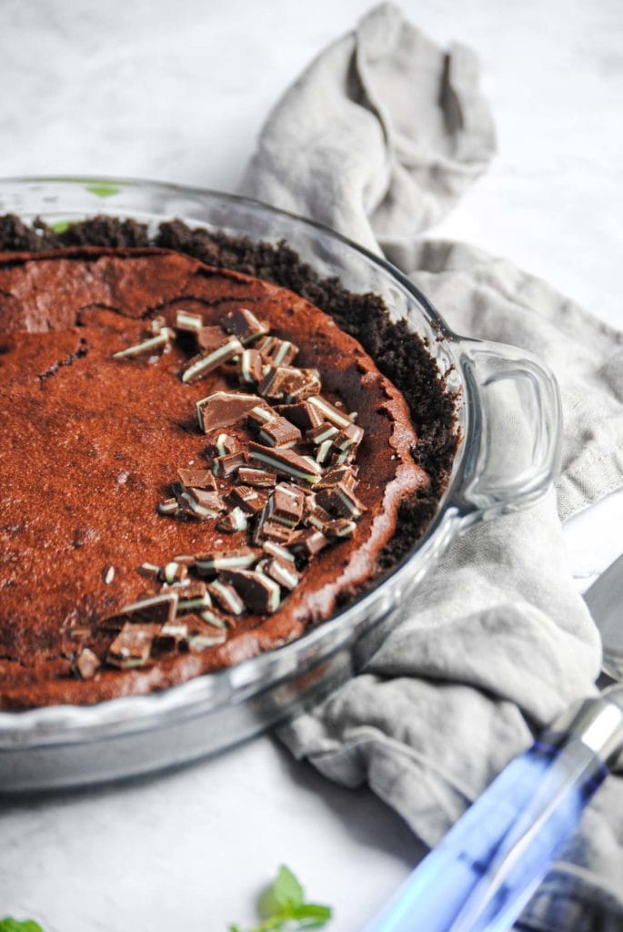 Cropped picture of half of a chocolate pie with chocolate mints on top