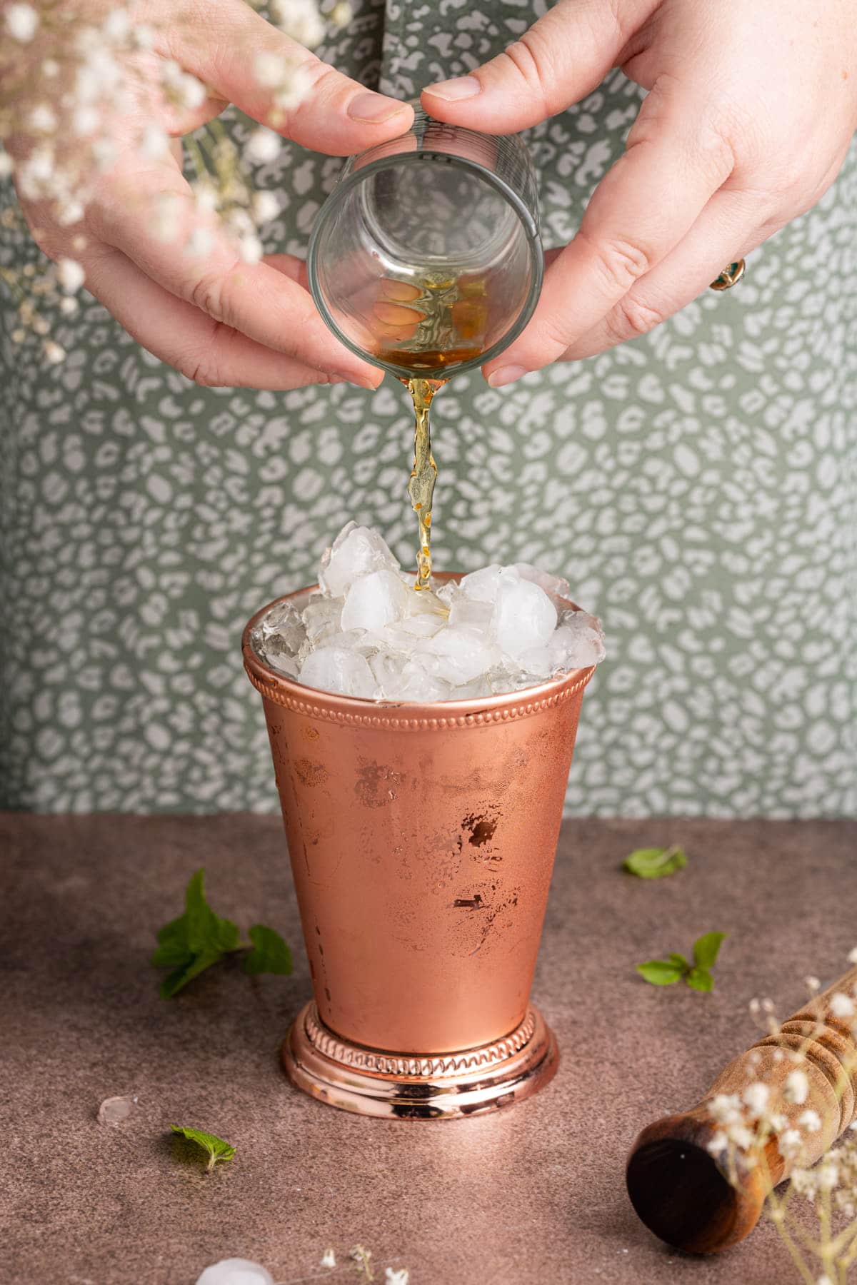 Adding Makers Mark Whisky to Mint Julep