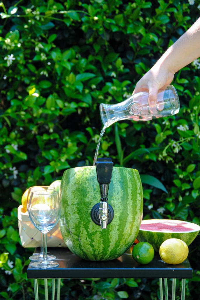 pouring vodka in to watermelon
