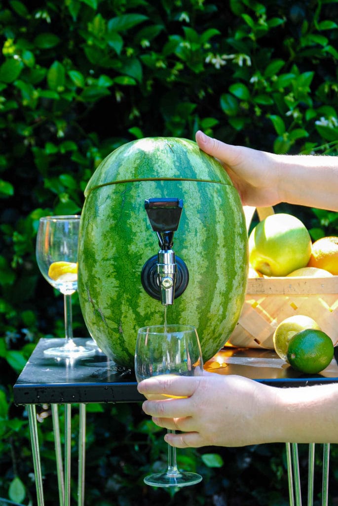 Serving sangria out of a watermelon