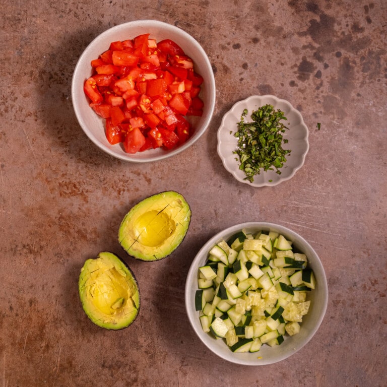 Diced tomato, cucumber, basil, and avocado flesh