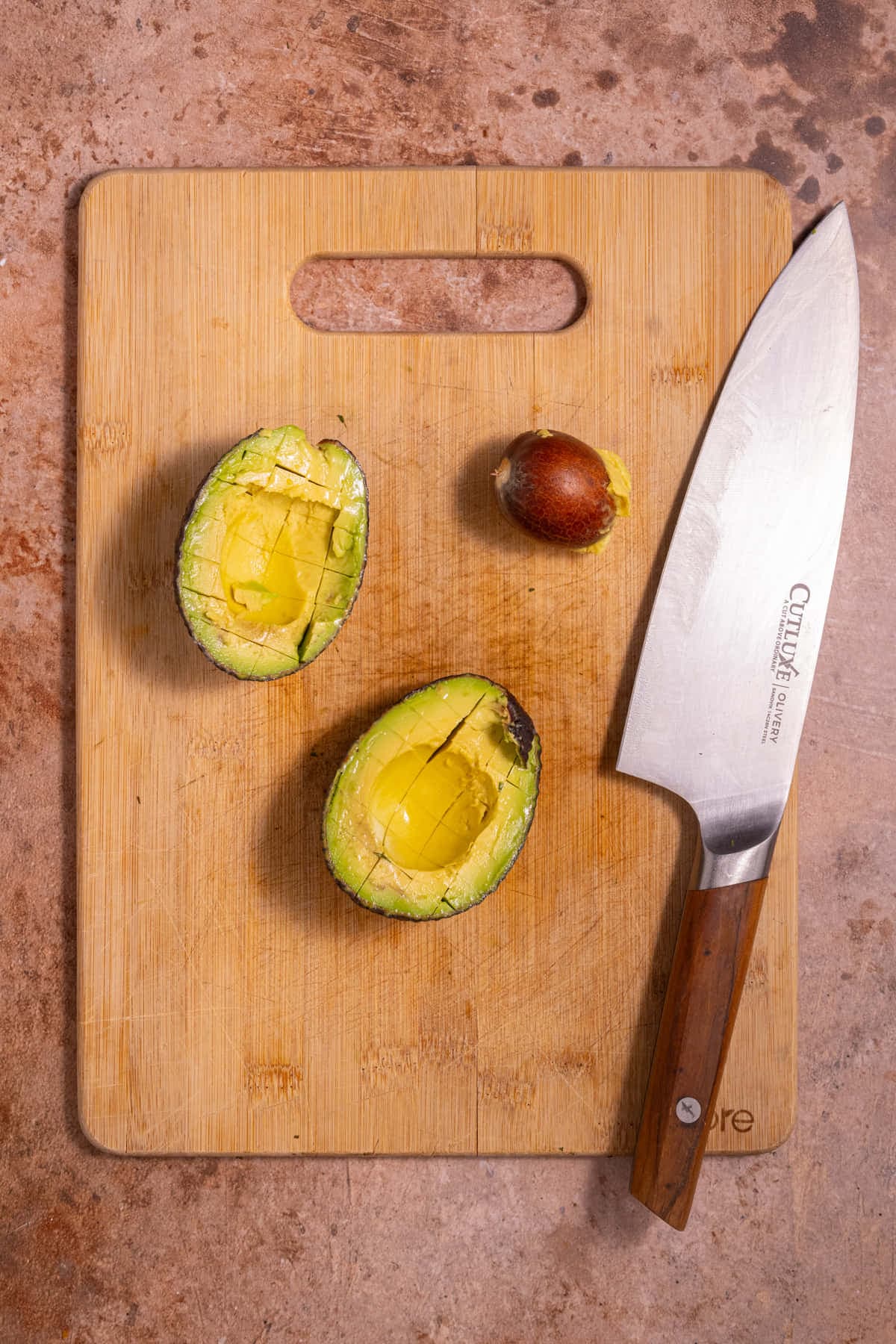 Avocado cut in half with pit removed