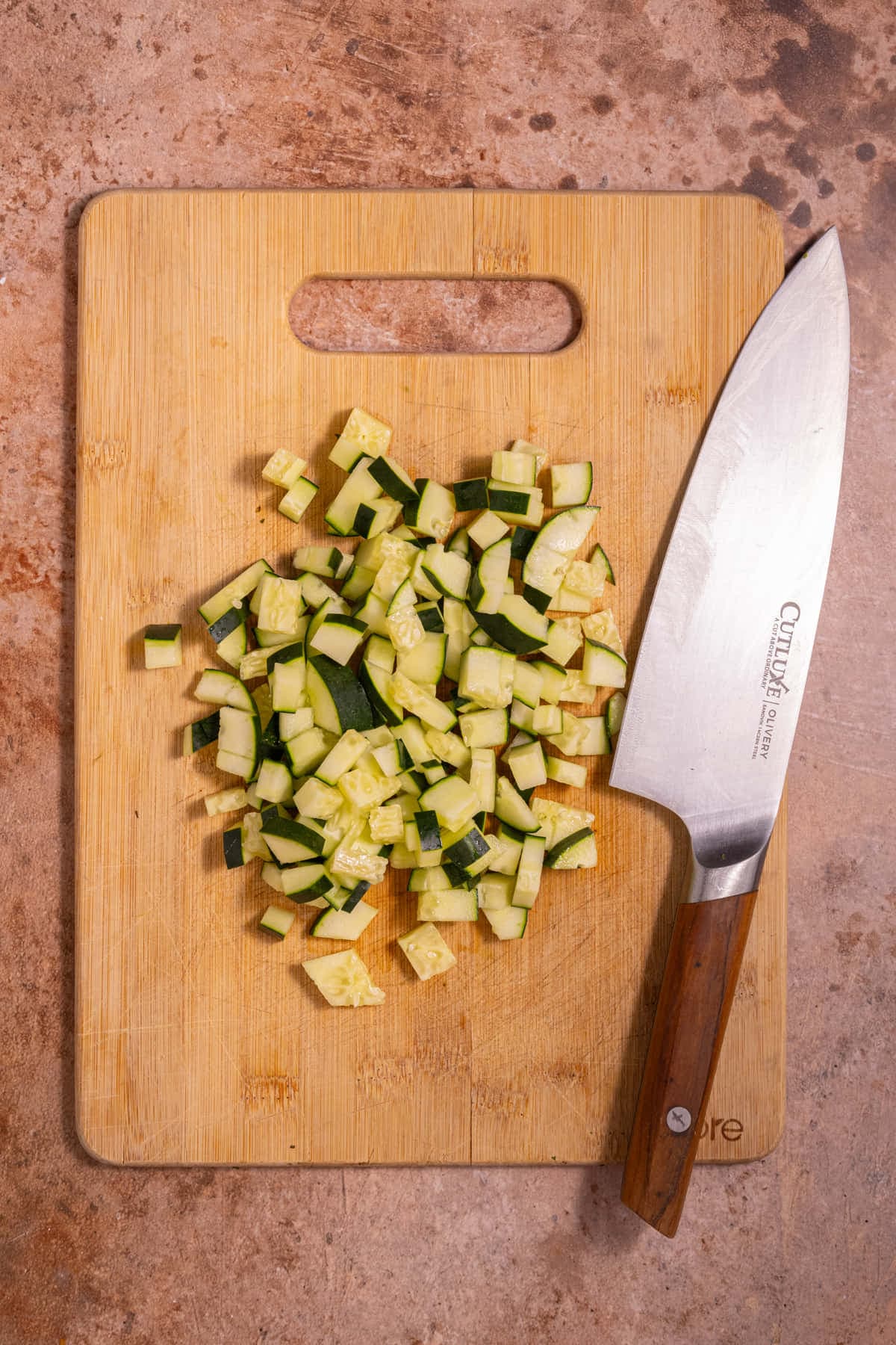 Diced cucumbers on a chopping board