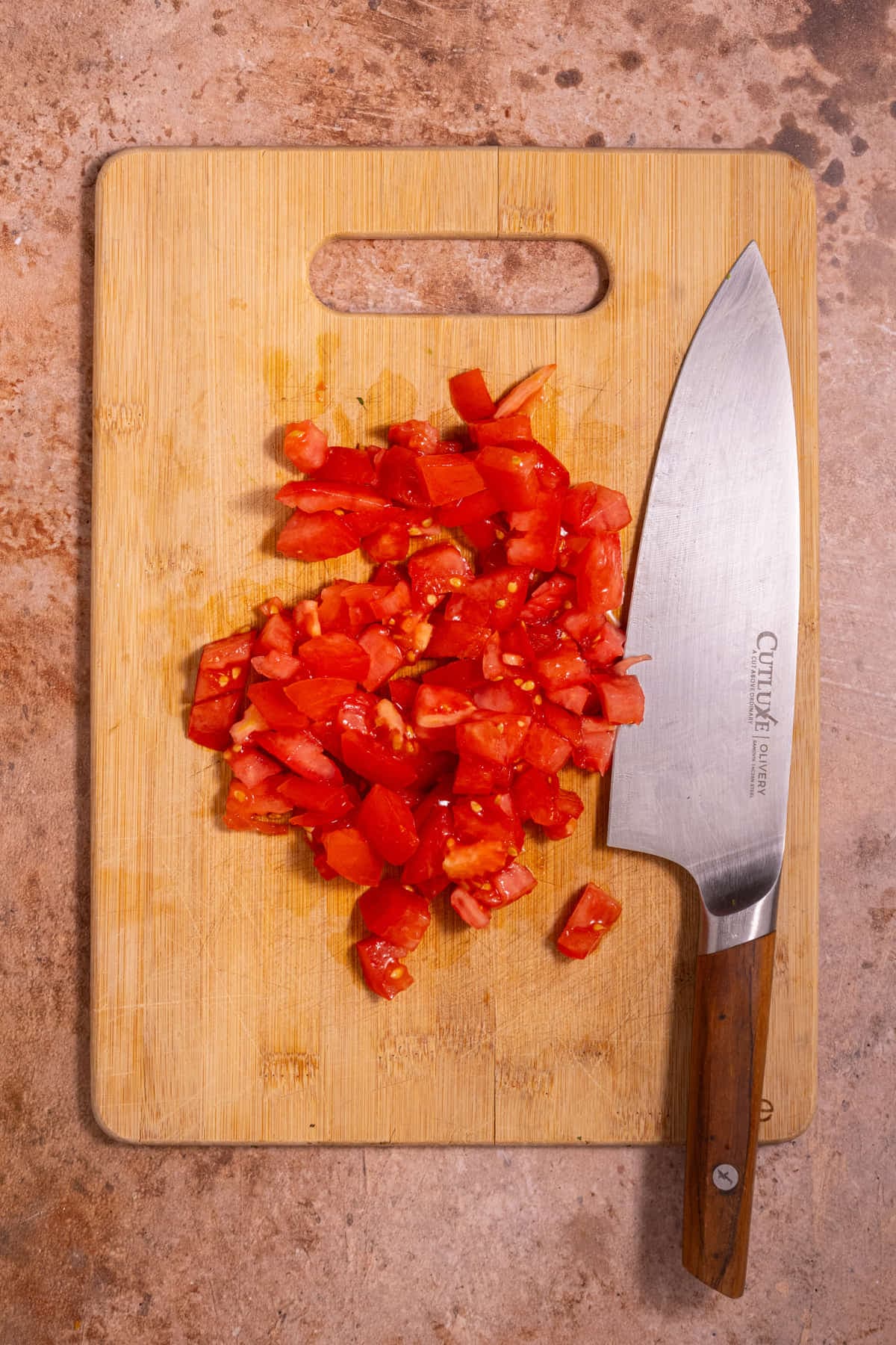 Diced tomato on a cutting board
