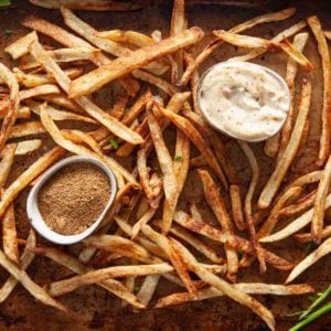 old bay fries with quick old bay aioli and bowl of old bay seasoning