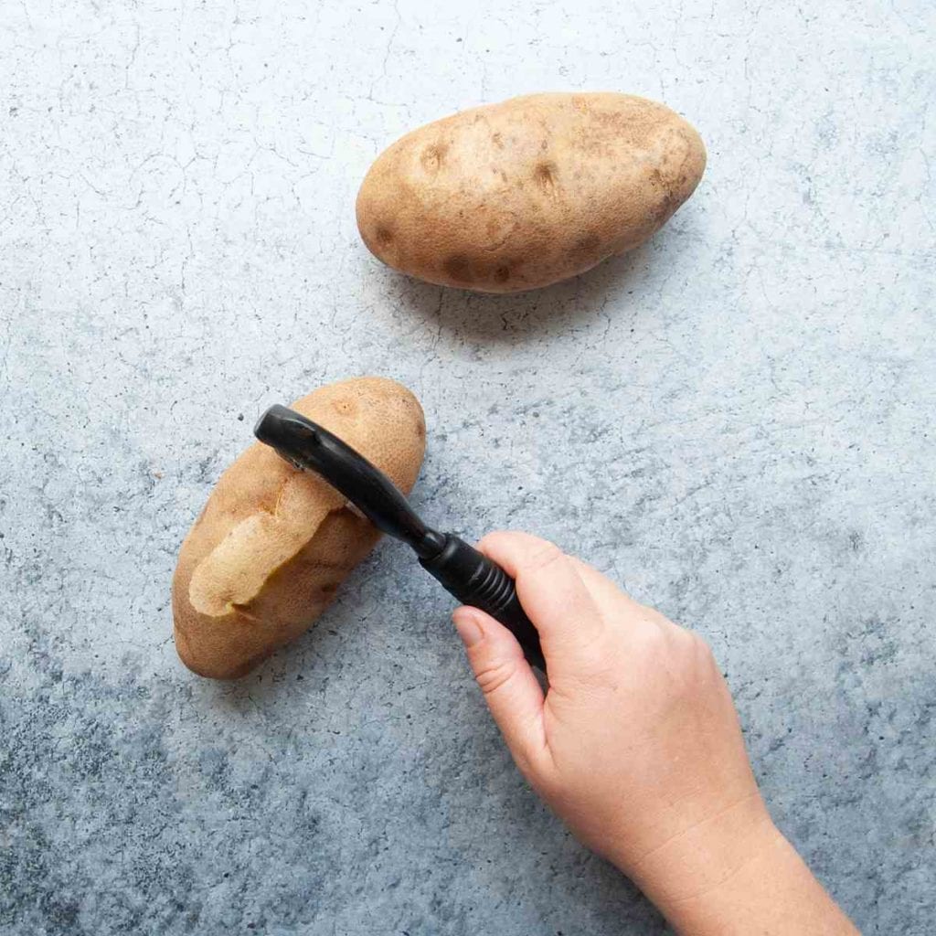 peeling potatoes