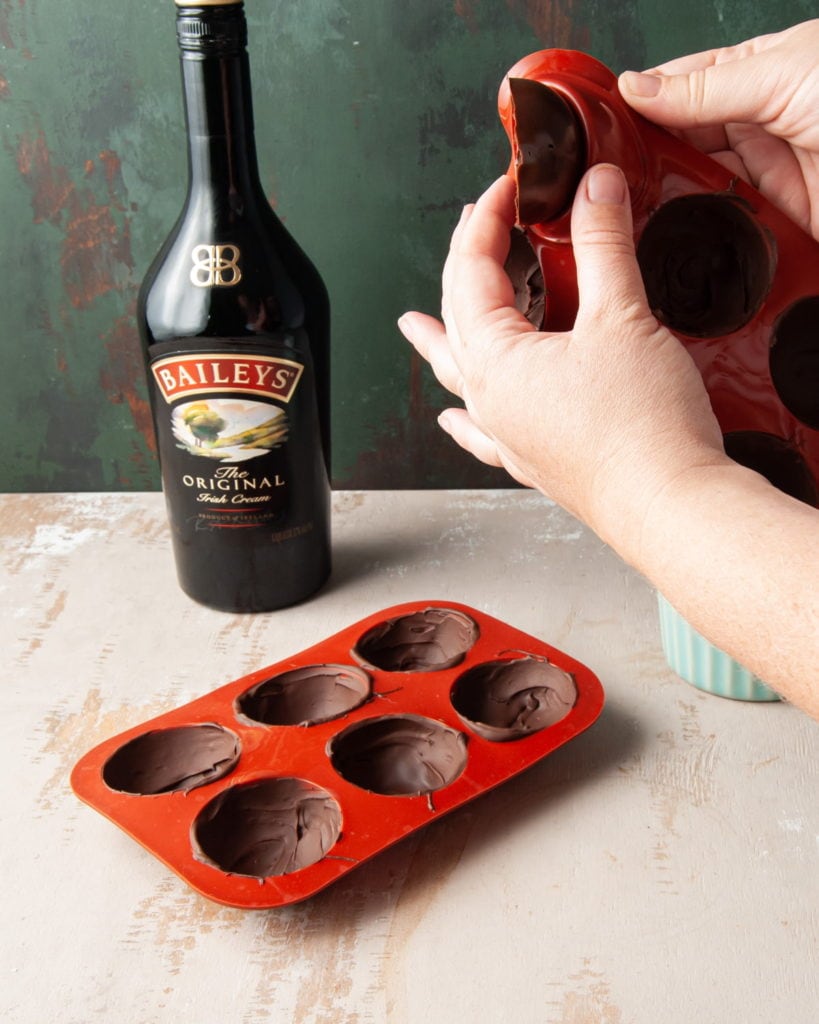 removing chocolate half spheres from mold