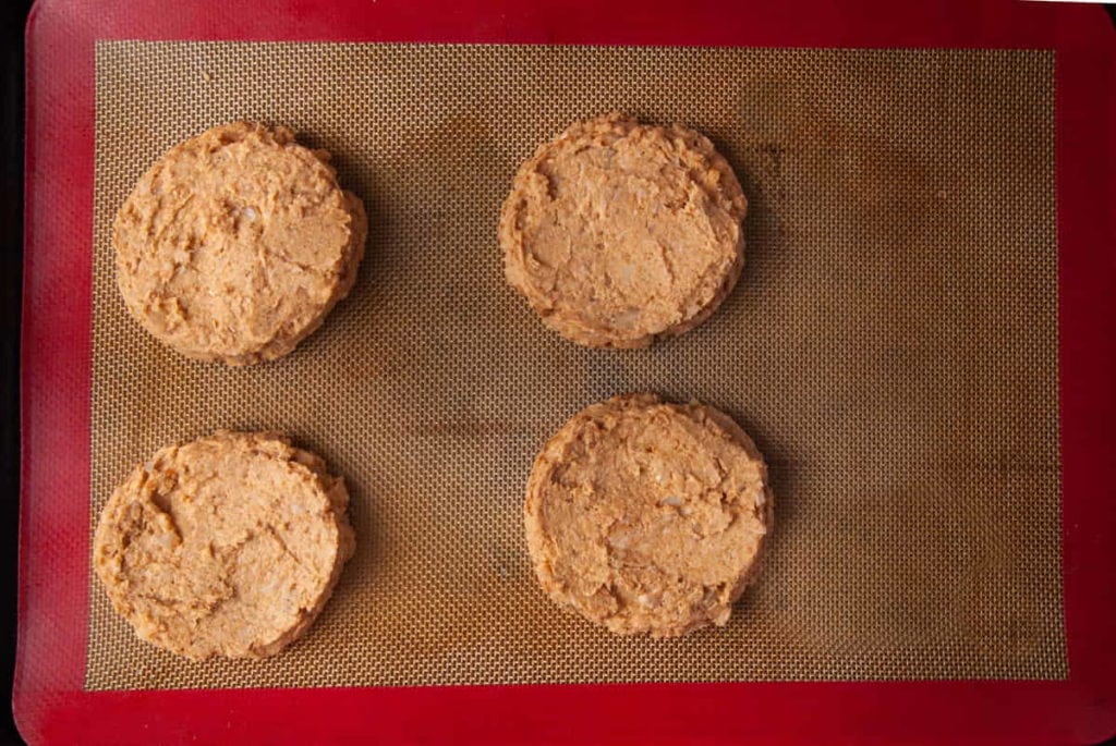 meatless burger patties shaped and ready for the oven