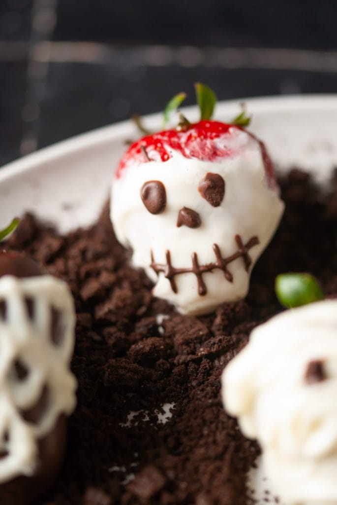 halloween chocolate covered strawberries close-up of skeleton design