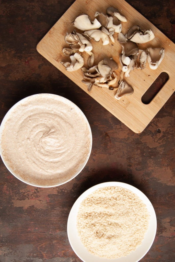 setting up to coat fried oyster mushrooms