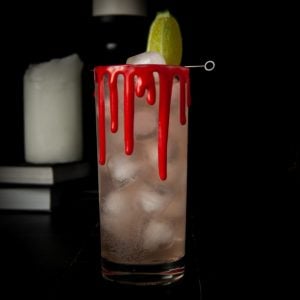 halloween cocktail with edible fake blood rim