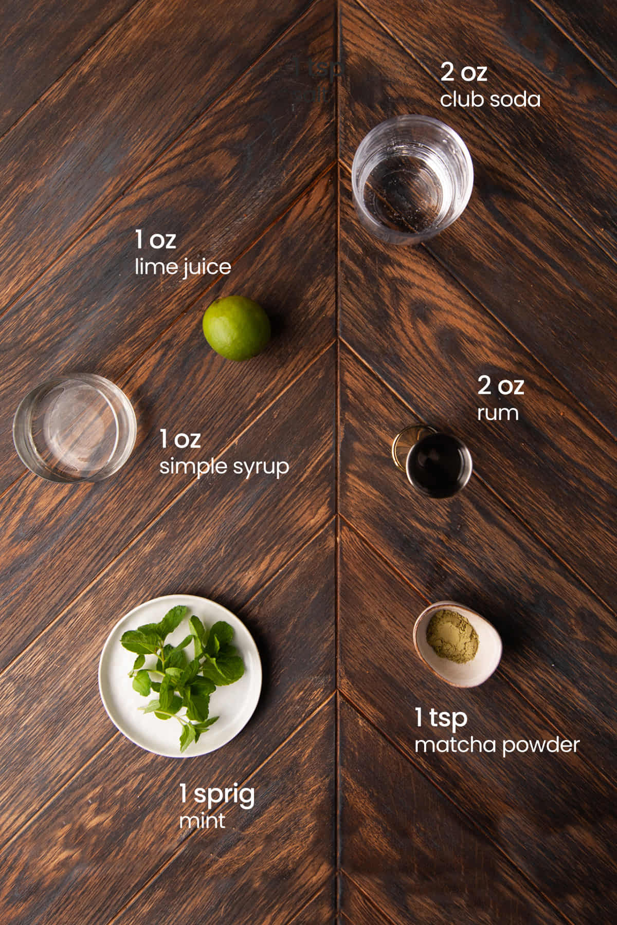 Everything you need to make a matcha mojito including white rum, matcha, simple syrup, lime juice, mint, and club soda.