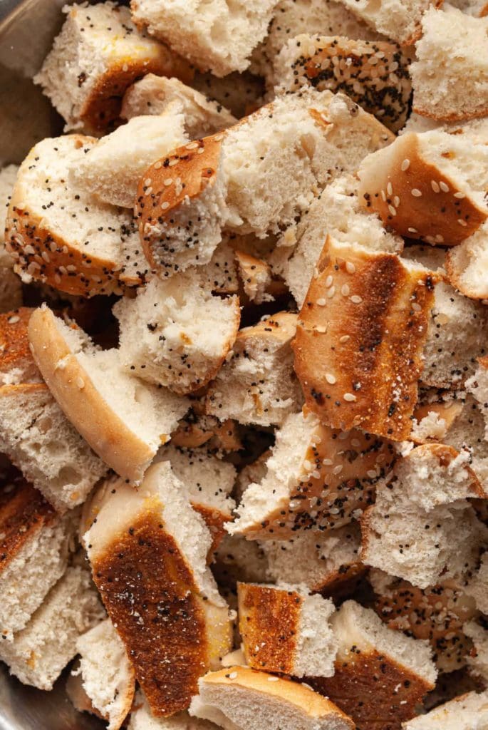 close up of everything bagels cut into cubes