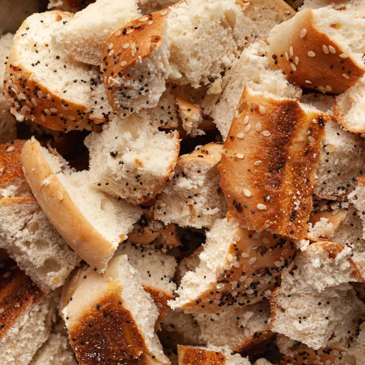 a close up of cubed slightly stale bread