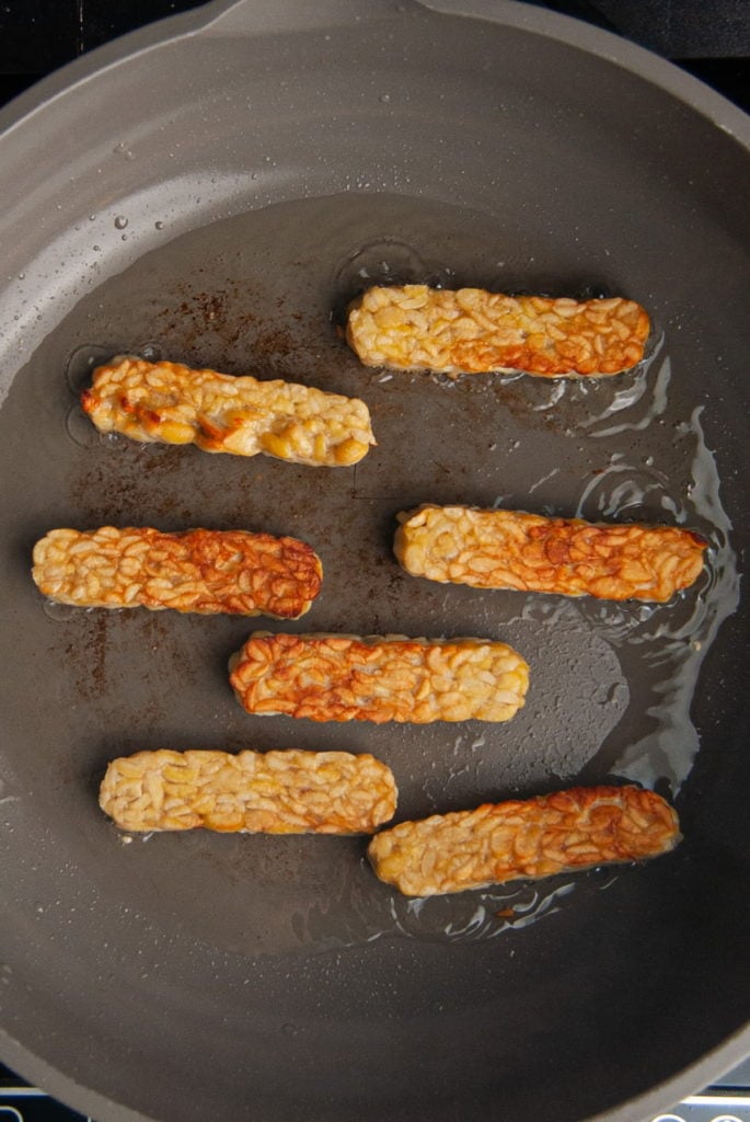 frying tempeh until golden brown