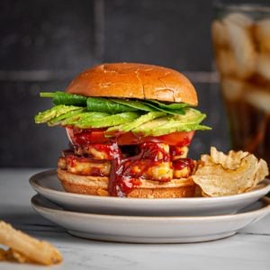 straight on photograph of stacked bbq tempeh sandwich