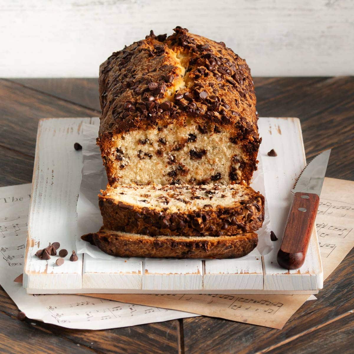 chocolate chip loaf cake with 2 slices cut