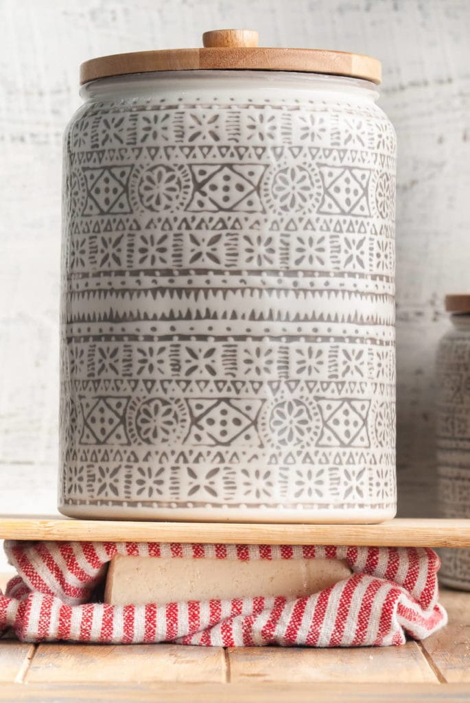 using a large container to weigh down tofu to press it