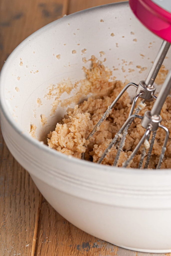 close up of creaming butter and sugar together to make no-bake cookie dough