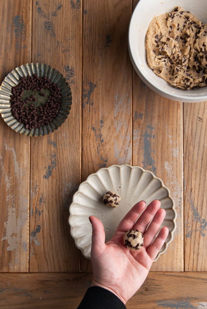 rolling cookie dough into bite-sized balls