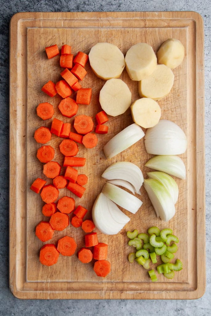 prepped carrots, potatoes, onion, and celery