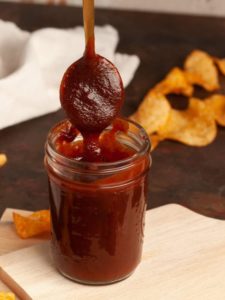 cropped-Easy-Vegan-BBQ-Sauce-Dripping-off-a-spoon.jpg