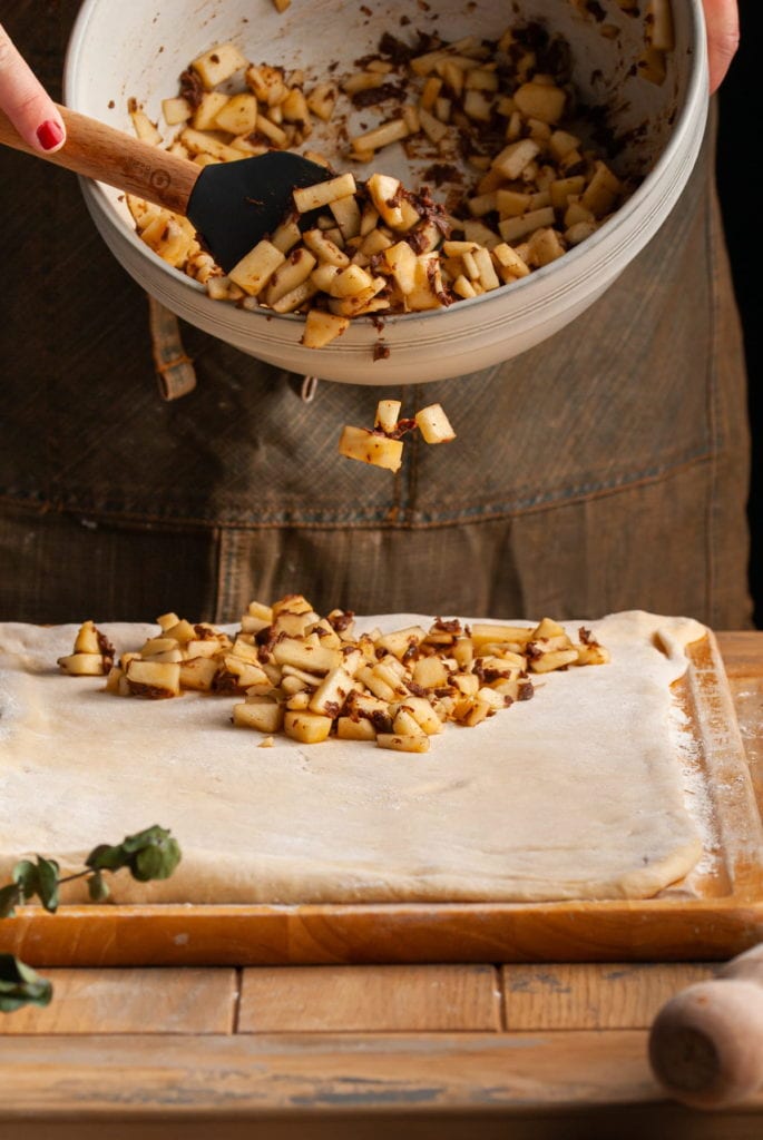 Adding apple pie filling to cinnamon roll dough