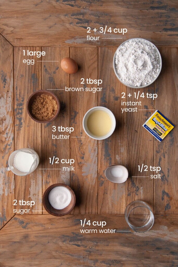 Ingredients for Cinnamon Rolls with Apple Pie Filling - powdered sugar, egg, brown sugar, butter, instant yeast, milk, salt, granulated sugar, and warm water.